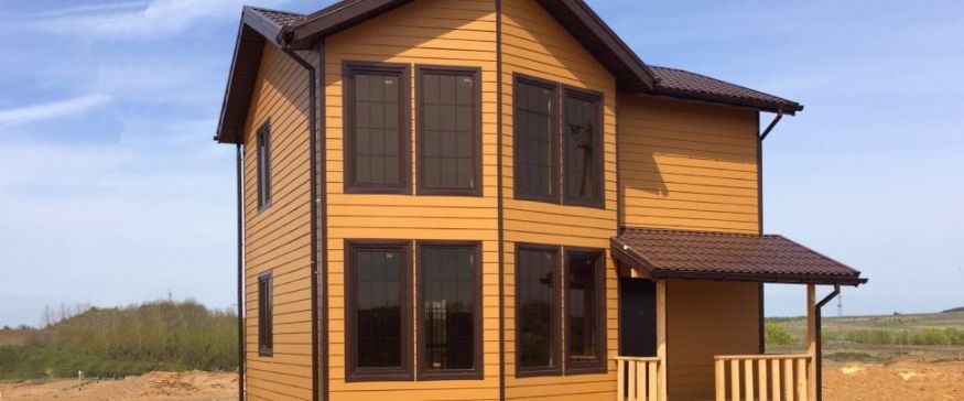 Фиброцементный сайдинг Latonit в цвете Красное дерево (RAL 8001/8008) купить в Санкт-Петербурге